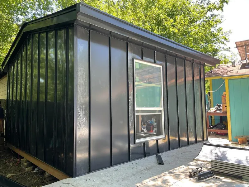 Black standing seam metal wall panels for Metal Roof Installation in Wagoner